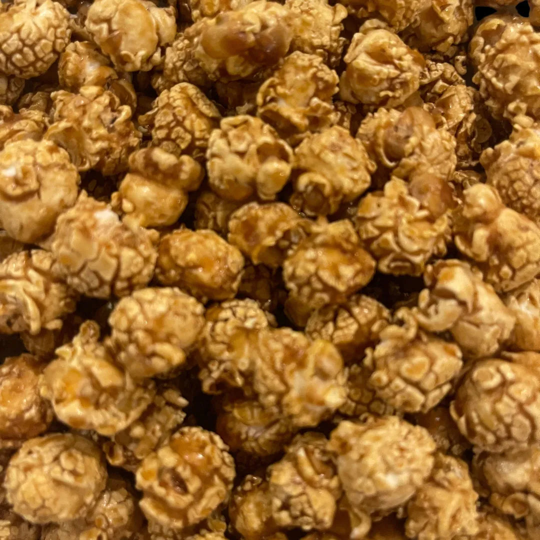 Close-up of caramel popcorn with a brown color.