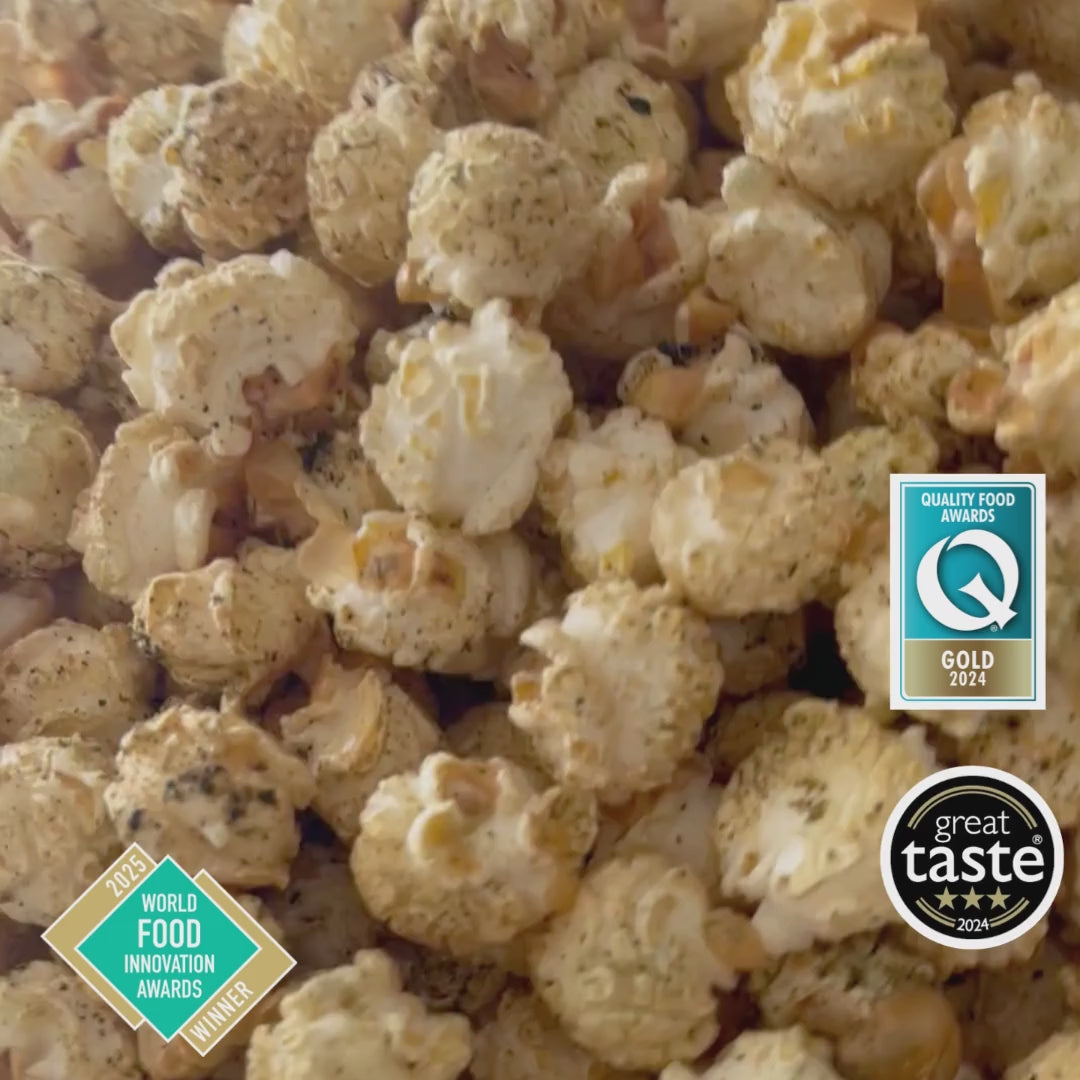 PopCornaa Vegan Seaweed, Wasabi x Soy popcorn on a plate, wide pan shot