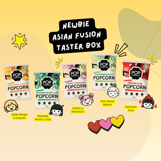 Collection of popcorn packages with colorful labels on a yellow background, featuring the text 'Newbie Asian Fusion Taster Box'.