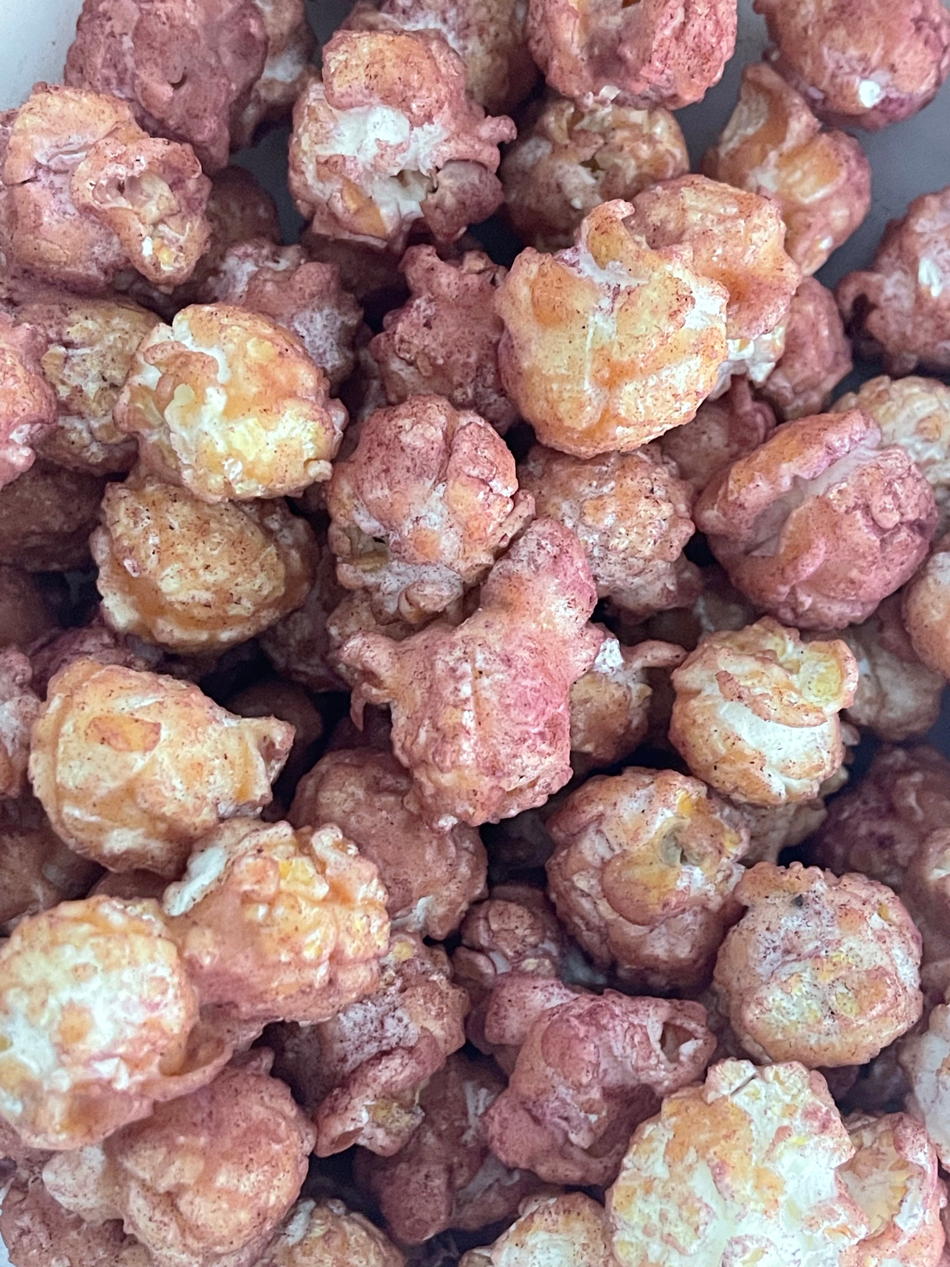 PopCornaa close up on 100% clean, dairy free strawberry, lychee and hibiscus popcorn