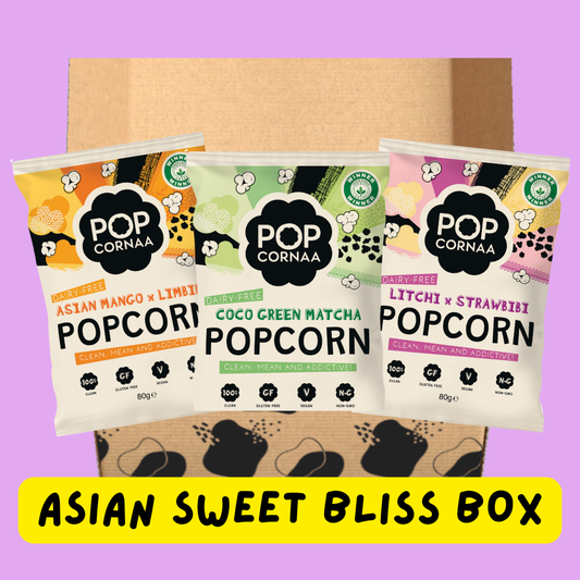 Three packages of Pop Cornaa Asian sweet popcorn with a purple background and yellow text box.